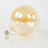 LED lichtbron filament E27 bol met amberglas ø20 cm